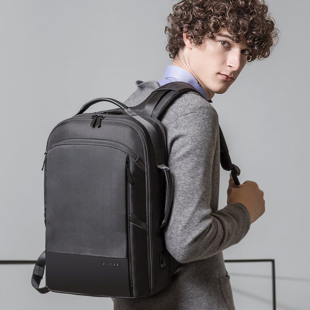 Rucsac laptop 15.6 inch, buzunar pentru tableta, cu iesire la casti si port USB, din poliester, rezistent la apa, buzunar anti furt BANGE BG-S55