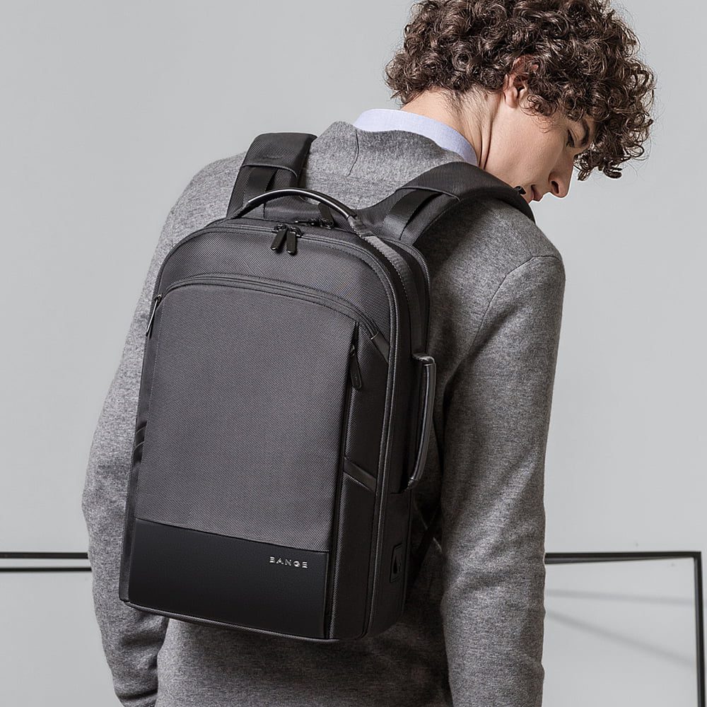Rucsac laptop 15.6 inch, buzunar pentru tableta, cu iesire la casti si port USB, din poliester, rezistent la apa, buzunar anti furt BANGE BG-S55